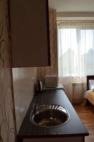 Отель SunLake Hotel Osokorki Киев Улучшенный четырехместный номер-2